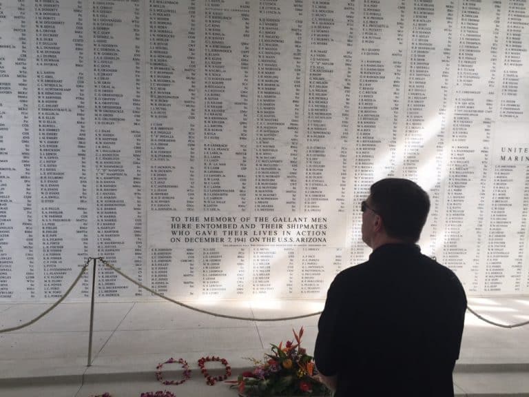 Dad taking a moment of silence for those who lost their lives at Pearl Harbor.