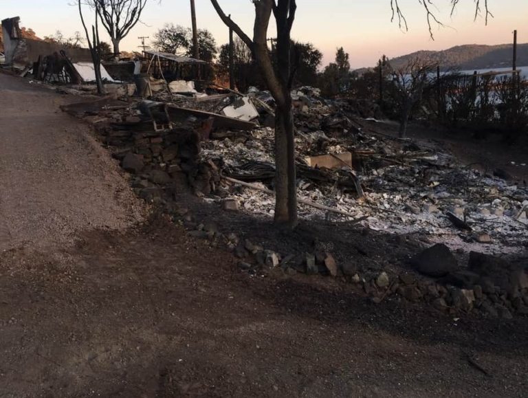 Our neighbor's house, completely flattened by the fire.