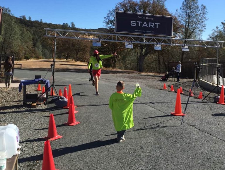 Adam running the race as "Forest Gump."