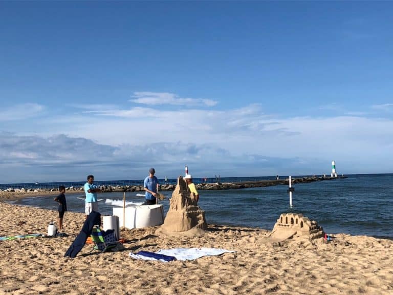 People making giant sand castles!