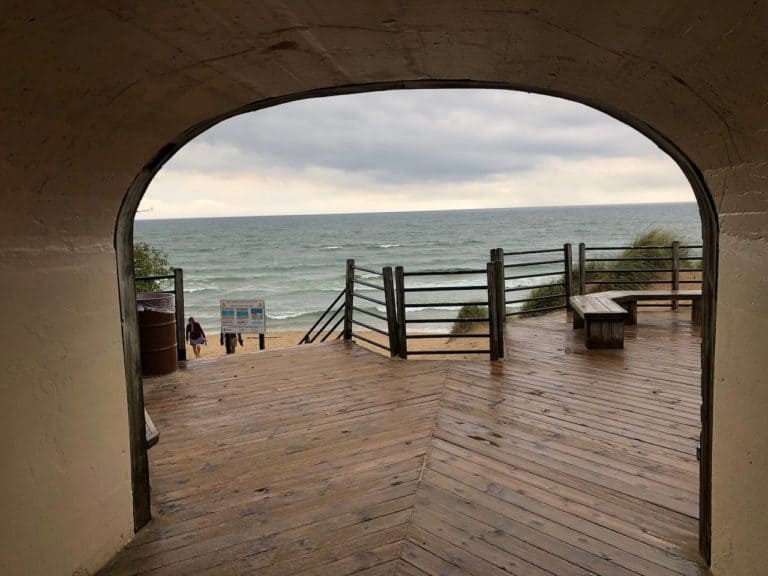 The tunnel through a dune brings you to another beach!