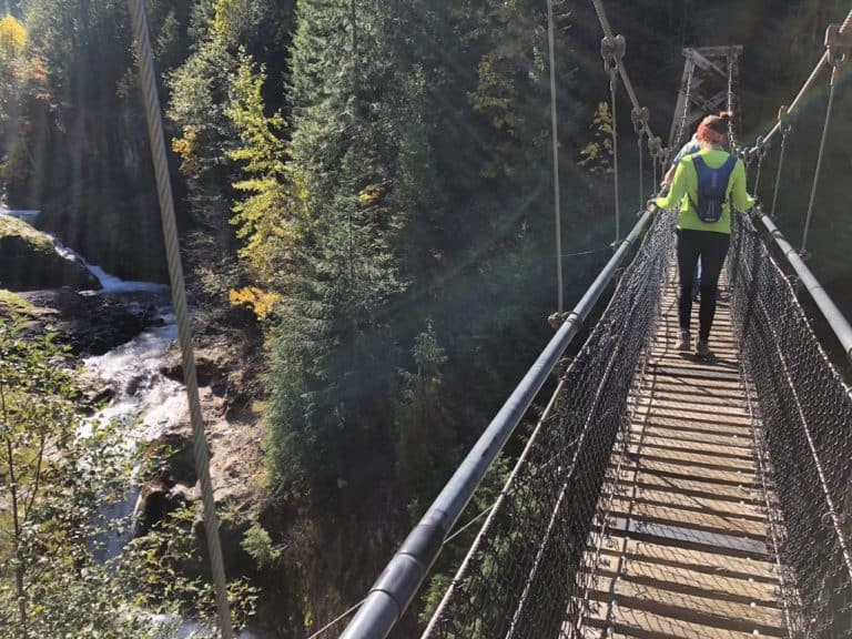 A suspension bridge with a stellar view of Lava Canyon!