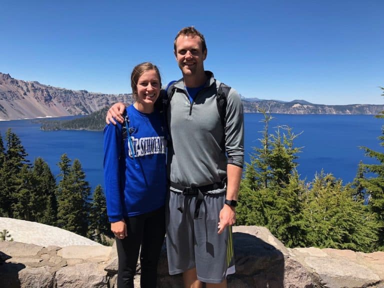 This lake is so blue that my shirt almost blends in!