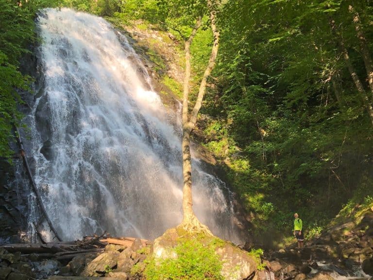 Even Adam looks small to this waterfall!