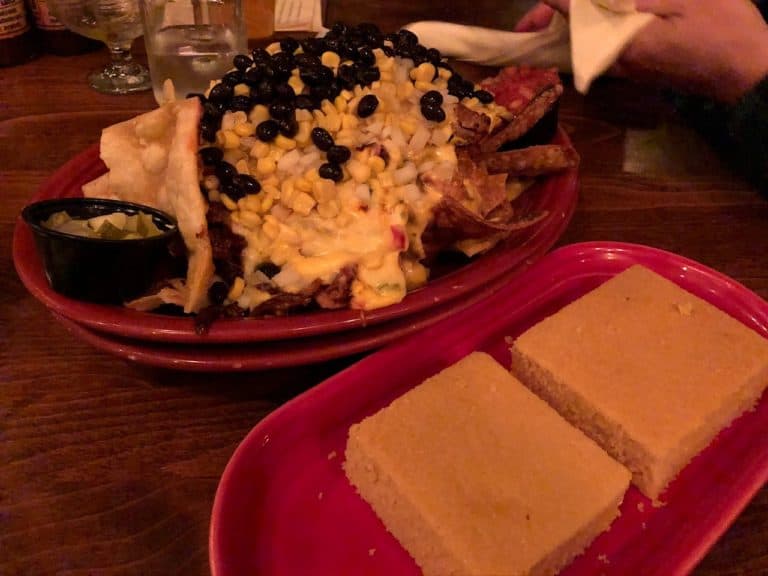 We highly recommend their rib nachos and warm corn bread!