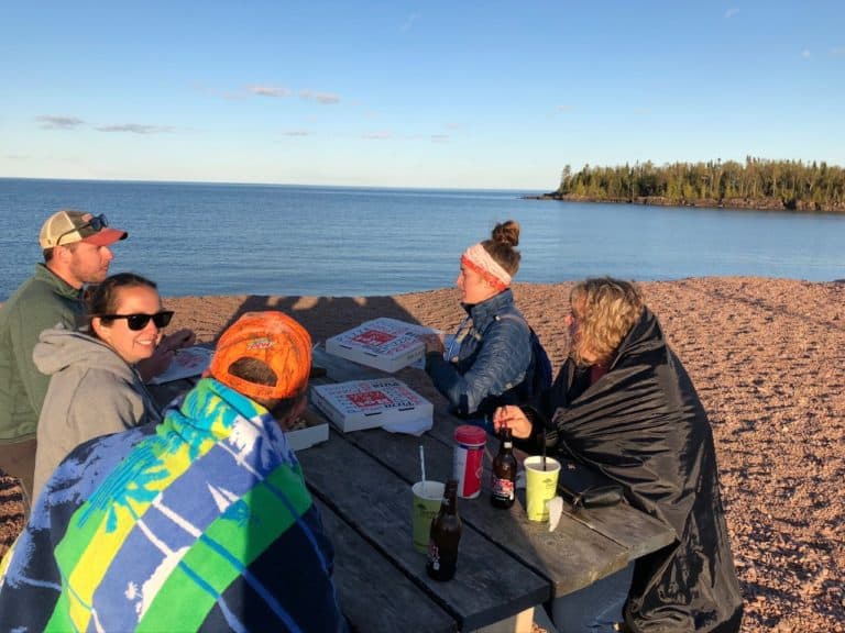 Eating some awesome pizzas on the shore!