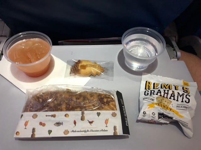 Our meal on a Hawaiian Airlines flight (complete with a complimentary rum punch)!