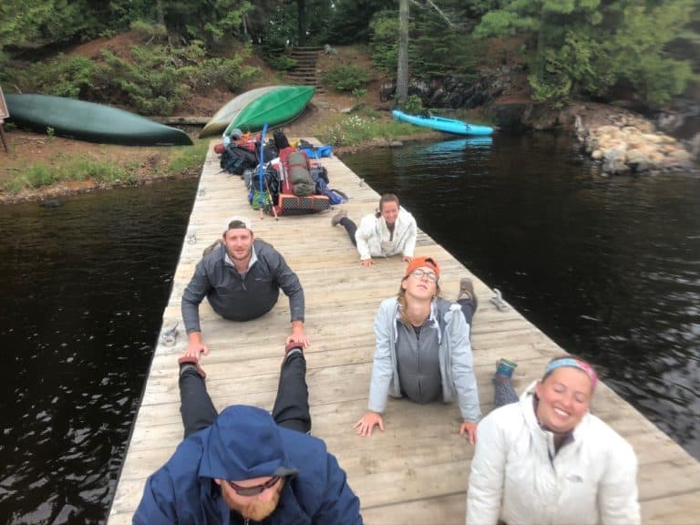 Doing some yoga before sitting in the canoes again.